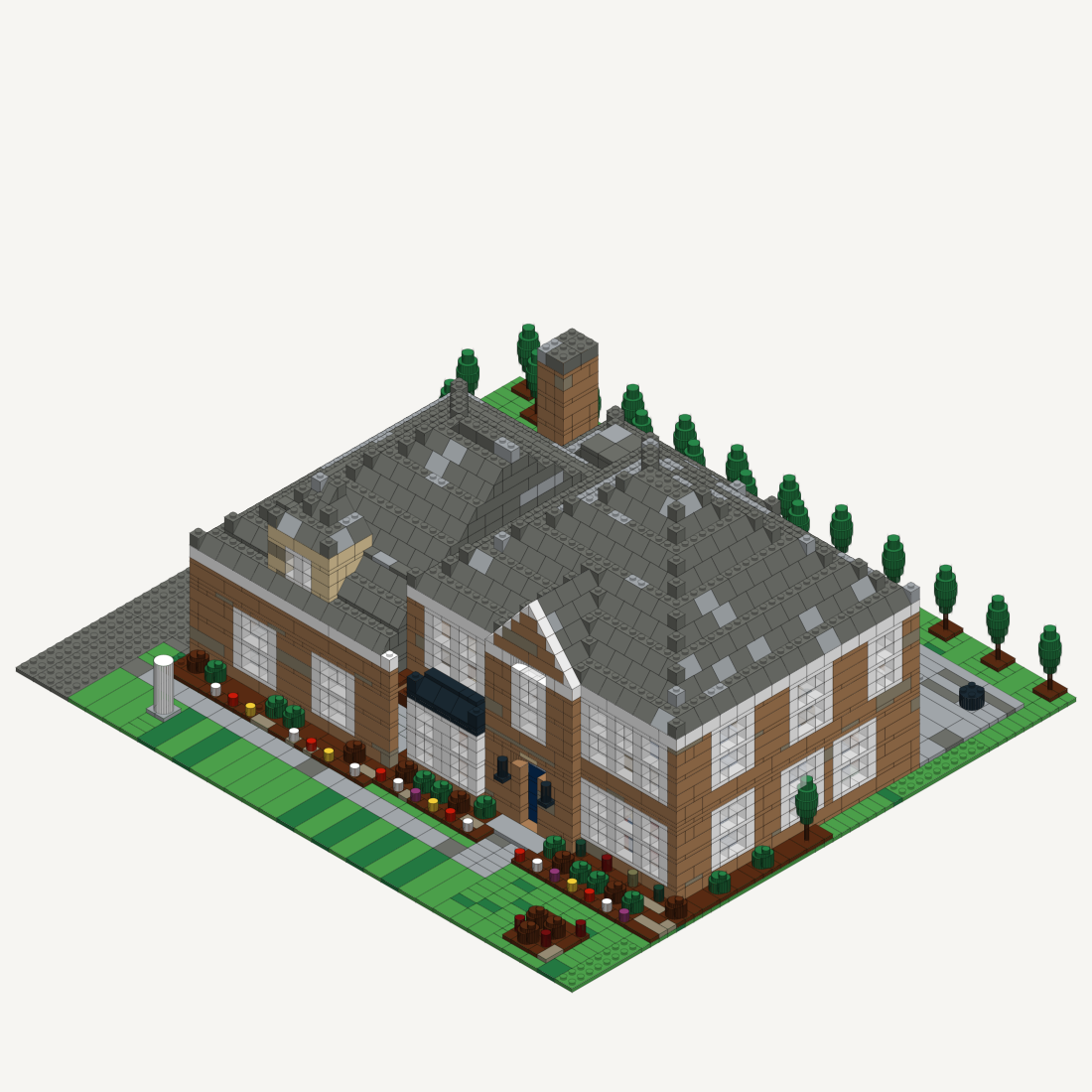A brick model of a two-storey colonial house with a garage wing, a bay window and a planted front garden